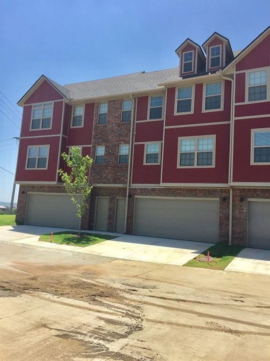 Beautiful townhouse off I49! Townhouse has 2 beds, 2.5 baths, 2 car garage with open concept layout. Kitchen and living area are complete with walk out patio, pantry, island, and all appliances. Large open, shared green space/backyard. Great location that is just minutes away from University of Arkansas, shopping and easy access to I-49. We process applications as we receive and once an application is approved, we reach out for deposit. Deposit secures the unit not the application. Please be aware of scams. Our application process is to be paid online through a secure portal, and we do not accept cash, CashApp, Venmo, and/or PayPal. No showings until after June 15th. Pictures of like unit - same layout