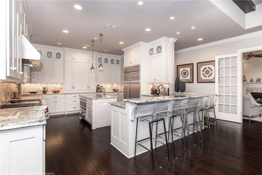 Exquisite European-inspired home that exemplifies elegance and comfort. From the moment you walk in, immerse yourself in the artistic beauty of the two-story foyer and graceful stairway leading to the interior balcony above. From the thoughtfully designed formal living area, double-french doors lead to the open family room, kitchen and breakfast nook with beautiful views of the backyard and spacious covered terrace area. The gourmet, well-appointed kitchen is sure to please featuring a center island, custom Wolf appliance package and tons of storage. This home has everything you want and need with beautiful finishes throughout…this much luxury and value is unparalleled. See Showing Agent Instructions.