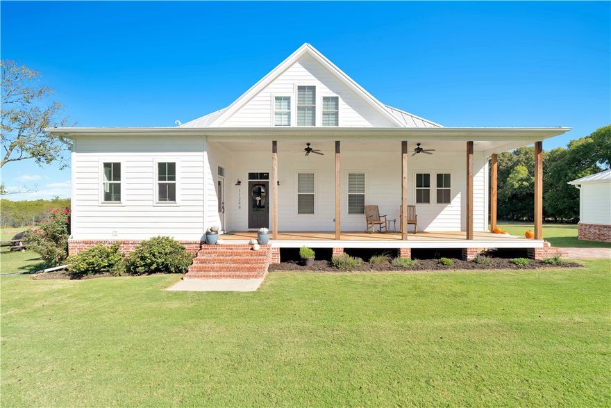 If you are searching for the perfect blend of country solitude and modern amenities all conveniently located close to everything that NW Arkansas has to offer, you may have just found your dream home. Located in Farmington less than seven miles from I-49, this meticulously built 2,500 sq. ft modern farmhouse sits on 7.5 acres and offers four bedrooms, three full bathrooms, and over 900 sq. feet of porches for unobstructed viewing of wildlife and evening sunsets.


Designed by the renowned team at Allison Ramsey Architects in South Carolina and built in 2017 by Foster Custom Homes, this private oasis includes a multitude of upgrades and special features like a standing seam metal roof, detached double garage, large walk-in pantry, high-efficient wood-burning fireplace, 10-foot ceilings downstairs and 9-foot ceilings upstairs, and hardwood and ceramic floors throughout. Starry nights, country comforts, and a lifetime of memories await you. This rare gem is sure to go quickly.