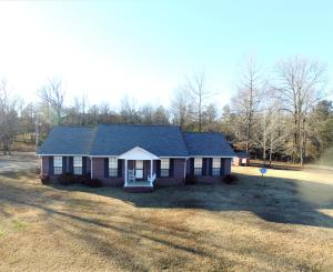 Rolling hills and mountain views is all you'll see from your front porch overlooking 35 acres and pond. Fenced areas for pets or animals and outbuilding and shed for storage, you'll never run out of room. Over 1800sqf home with 4 bedrooms and 2 full baths, large living area, formal and eat in dining.
