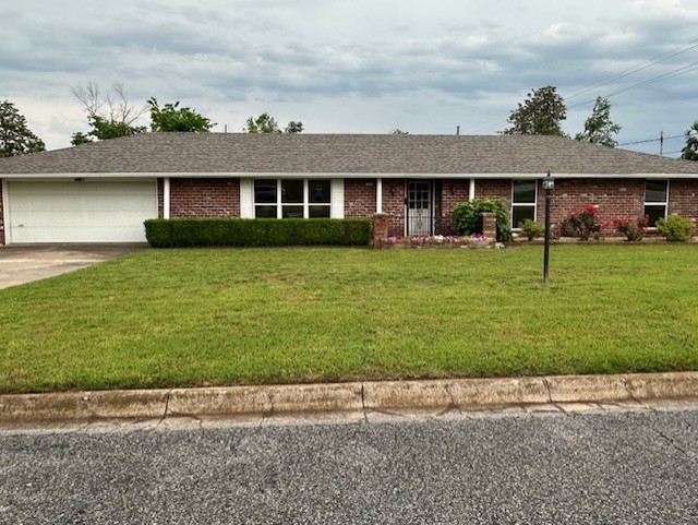 Fantastic central location and rental potential! Home sits on corner, with front two car garage entrance on Will Rogers, and second attached large garage/workshop entrance from 8th St. Ranch style 3/2 with recent beautifully remodeled master bathroom. Home features a large family room, a dining area with a fireplace, brand new four season room that is heated and cooled. The four season room leads into a wonderful recently remodeled 600 sq ft garage/shop. So many possibilities!! New carpet, new windows throughout, new hot water tank, and new roof. Backyard features flagstone patio, storage shed, and greenhouse. Pet-friendly synthetic turf in backyard. One block from Railyard Loop Trail which connects to Razorback Regional Greenway. One mile from Historic Downtown Rogers!
