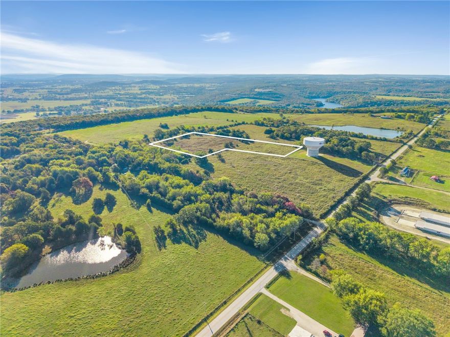 8.16 Acres of Privacy! - Located just north of Lincoln Lake with an easement from Jackson Highway, this 8.16 Acres is tucked back off the road offering privacy and convenience. This is a great location for building your dream home or a secluded getaway. Enjoy the scenic ridge top with breathtaking views while utilizing the established pasture/hay ground making this ideal for livestock or recreation. This property is fully fenced and features city water and utilities available at the road. Lincoln water tap has been approved. Perc test has been completed as well. Enjoy privacy and convenience, just 10 minutes to Lincoln schools, shopping, gas, and dining, 20 minutes to Siloam Springs or historic Prairie Grove, and only 30 minutes to the University of Arkansas. More land is available for purchase if desired. Also See MLS# 1326116, 1326221, 1326237, 1326244, 1326252