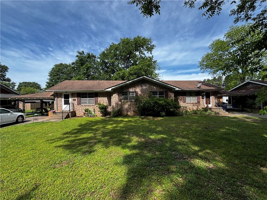 Hard to find investment opportunity on this Brick Duplex. Walking distance from downtown, and the University of the Ozarks, and the recreation walking trail runs right across the street. Nice sized rooms and everything in good condition. Carport parking and nice yard. Call to see this one today.