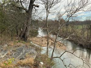 This one has it all!!!!!! War Eagle River frontage for approximately 1/2 mile, far enough north for great water, 80% bluff with long views 20%river access, about 40% open, run cows, develop home sites, hunt, fish, build your dream home, great access and location, 15-20 minutes to Springdale/Fayetteville, power, rural water, surveyed, Hwy. 45 frontage, county road frontage. Don't wait long and regret it!