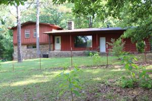 Large 4 bedroom 3 bath home on 4.31 acres. About 2 acres fenced for animals. Repair and reap the benefits of this home.