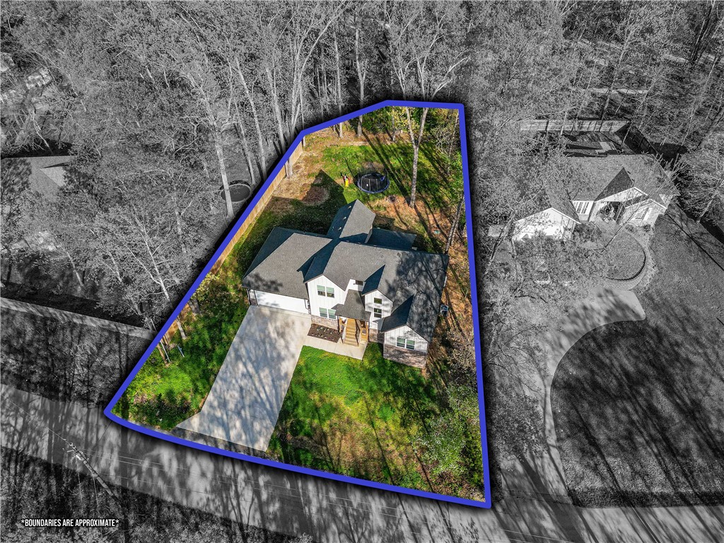 This stunning residence, built in 2022, offers 3 bedrooms plus an office along with 2.5 bathrooms. Besides being a show stopper on curb appeal, it also offers a flat backyard which can be hard to find in Bella Vista and the trails are just around the corner. Downstairs you will be greeted with an open concept of the living room, kitchen, and dining area. Don't miss the hidden pantry! The office could also make for a nursery since it shares the downstairs with the primary bedroom and suite bathroom. Upstairs, past the cat walk with a view below, is two more bedrooms and a hall bath along with a reading nook. There's even a potential for some more square footage addition in the attic if desired. And talk about location! This home is walking distance or a short bike ride from the Metfield Clubhouse along with the paved trail or plenty of options to drop into the mountain bike trails just down the road from the front door. Scan the QR code for a video of the area and set up your showing appointment today.