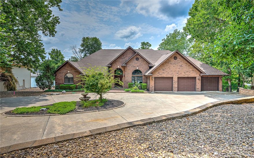 Experience unparalleled living in this exquisite lakefront home on Loch Lomond. Nestled on a generous .58-acre lot, this home offers over 4,000 sq ft of luxurious living space, designed to capture panoramic lake views from every angle. The home features three spacious bedrooms and three bathrooms, providing ample comfort and privacy for family and guests alike. Step inside to discover two expansive living areas, each perfect for relaxation and entertaining. The design seamlessly connects the living spaces and highlights the stunning views. Imagine waking up to serene lake vistas, enjoying morning coffee on the deck, and spending evenings by the water. For those who love the outdoors, the private boat dock offers easy access to the water, making it ideal for boating, fishing, and water sports. The beautifully landscaped yard provides a peaceful retreat, where you can unwind and soak in the natural beauty that surrounds you. Embrace the tranquil lifestyle and make this your dream sanctuary on Loch Lomond.