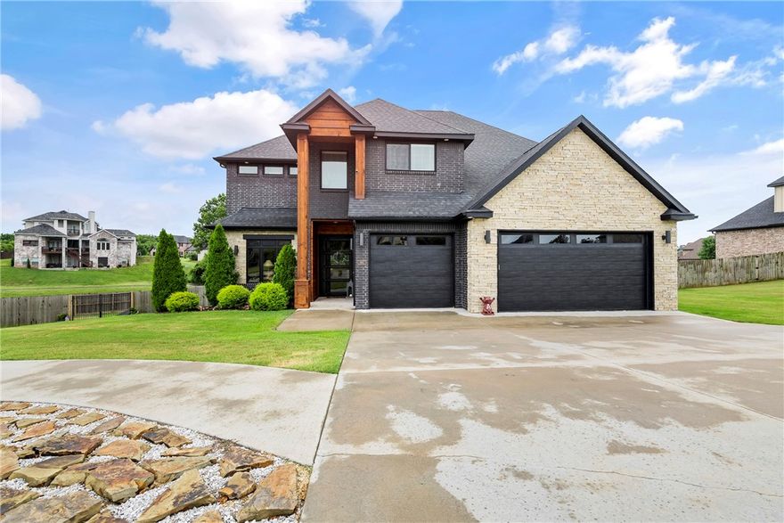 Custom Built in Otter Creek! Prime Neighborhood .83 acre Lot that is Lake-Side and next to Pool, Tennis Courts and Trails!  So many custom details throughout, starting at the 8’ custom steel front door!   Open kitchen/living features large custom steel island w/ built-in rotating bar stools & walnut countertop, custom hood vent, wall shelving, coffee bar, built-ins around commercial size fridge/freezer, tray ceiling w/ beams/wood accents, custom ceiling fan, wet bar & formal dining.  More upgrades include beams/accent walls in each bedroom throughout home, including walnut sink bases & over-sized walk-in shower in master bath. 8’ solid wood doors, barn doors, 100 gal recirc hot water tank, central vac, dog wash station in laundry, pre-wired for speakers & outdoor sec. cameras, soft close doors/cabinets, extended garage, upgraded hardware, real oak hardwoods, upgraded carpet/padding & 2 large attics.   Fully folding steel door opening to the screened in porch and the huge flat backyard!