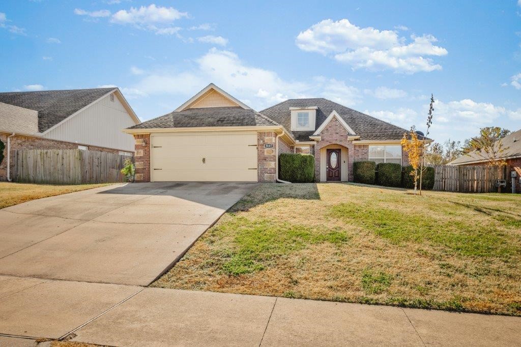 Beautiful Riverwalk Home in Bentonville! This 3 bedroom/2 Bath home boasts spacious rooms and privacy fenced backyard with covered deck! Large entry welcomes you in, to the right is the kitchen and dining area. Dining area features a built-in seating bench with window overlooking the front yard. Kitchen has granite counters, stainless appliances, pantry, and plenty of workspace. Large utility room and 2 car garage. Split floorplan offers guests privacy with 2 large guest bedrooms and a full bath with built in open shelving for added function and dƩcor. Living room has corner gas fireplace, wood laminate flooring, and access to the covered deck for outdoor living. Primary bedroom has great natural light with large WIC and an attached bath with whirlpool tub, shower, and linen storage. Enjoy a great location close to schools, shopping, dining, as well as fantastic community amenities. Welcome Home.
