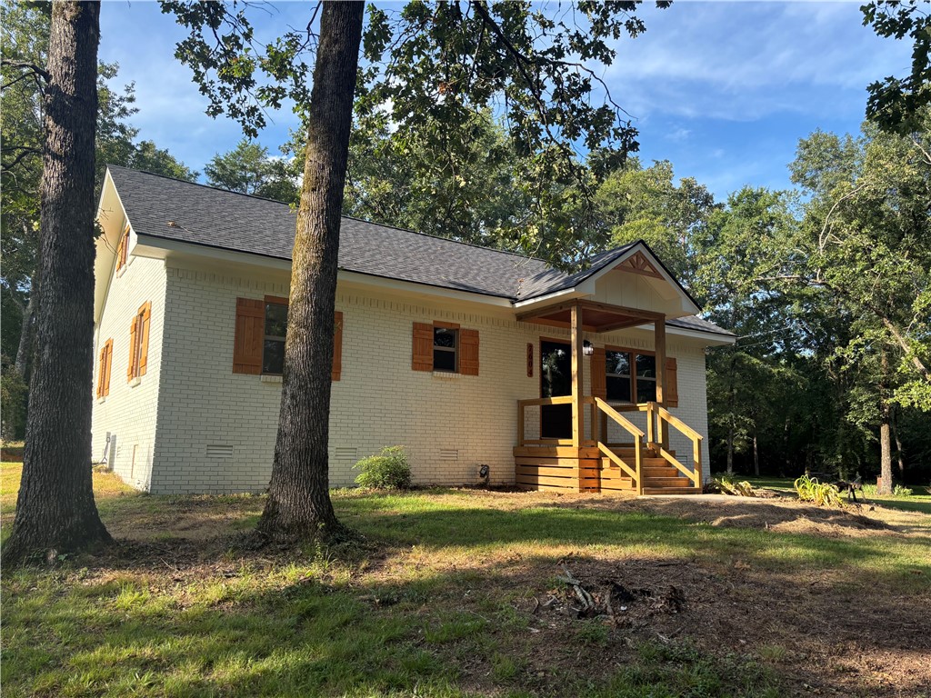 Hard to find home in the Hector school district! Featuring 3 bedrooms 2.5 bath this country retreat is fully remodeled and nestled on over 3 acres. With a modernized blend of rustic charm and contemporary elegance makes this home a must see! There is potential for a 4th bedroom or home office, perfect for a growing family or remote work complete with a large workshop and an adorable "she shed".