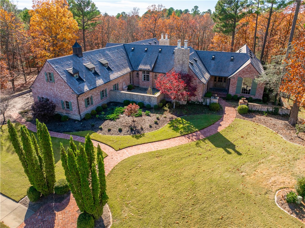 Step into unparalleled luxury with this expansive 5,171 sqft home that seamlessly blends style, comfort, and functionality. Offering 3 spacious bedrooms, 3 elegant bathrooms, and a versatile bonus space upstairs, this home has it all. The bonus area, complete with a full bathroom and walk-in closet, can easily serve as a 4th bedroom, home office, or private guest suite. The private pool sets the stage for outdoor leisure, while the wet bar ensures every gathering is unforgettable. The kitchen is a chef's dream, featuring a premium Sub-Zero refrigerator and custom built-ins for ultimate organization. A thoughtfully designed built-in desk offers the perfect space for work or creativity. Pet-friendly features abound, including a convenient dog washing station in the laundry room, adding a touch of practicality to everyday life. This home is more than a place to live, it's a lifestyle. Make it yours today!
