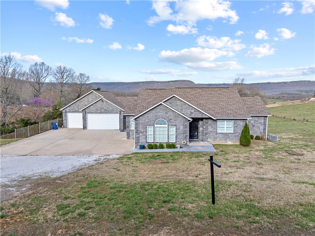 Discover your dream home at 8472 Fork Creek Rd, Harrison, AR! This 4 bed, 3.5 bath gem boasts a finished basement and an attached guest house apartment complete with a kitchenette. Home has like-new construction on 10 acres, enjoy views of Gaither Mountain and a serene spring-fed pond.
The kitchen is a chef's delight with stainless steel appliances, soft-close cabinets, and a convenient pantry. The luxurious primary bedroom offers a double vanity and two spacious walk-in closets. Ideal for family living and entertaining, this property combines elegance, comfort, and stunning natural beauty. Don't miss your chance to own this exceptional home! Square footage is approximate.
Only a short drive to the Buffalo National River and hiking trails to the south and Branson, MO to the north.