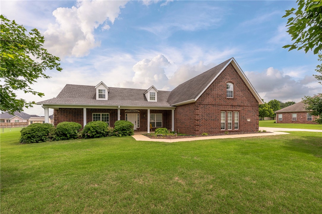 Sitting on almost an acre, this Elm Springs home features 3 beds plus a bonus room, 3 full baths, a 2-car garage, a gas fireplace, a covered back patio, an irrigation system, and a 24X24 detached shop. Updates include a new roof (June 2025/July 2025) and a new water heater in 2025, along with newer flooring in select areas of the home. You'll get a well-maintained home with an excellent location that blends privacy and convenience, close to the Shaw Family Park, Lake Elmdale, Brush Creek Golf, The Creeks Golf, shopping, restaurants, and access to Highway 49. With a timeless look of all brick exterior, mature shaded trees, and a completely flat fenced-in backyard, you'll have curb appeal and a great outdoor space for entertaining.