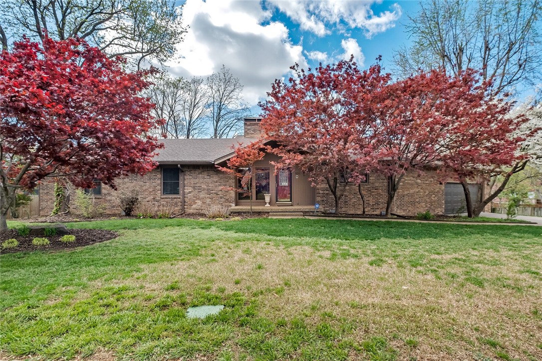 This Wonderfully Spacious 4 bed, 3.5 bath Home in Established Chateau Terrace has so much to Offer on a Large Private Lot and Ready for your Personal Touches! Centrally located in Rogers, w Quick Access to Downtown, I-49, Walmart Amp, Mall, etc. The Living Room, just off the Entry features a Beautiful Showcase Fireplace, Built-ins & Wall of Scenic Windows. Kitchen boasts Tons of Cabinetry, Storage and View from Sink Window. Dining Room w Back Deck Access opens to Kitchen & Living Room, allowing for Tons of Entertainment. Main Level offers Primary Bedroom Ensuite, & 2 Other Bedrooms w adjoining Bath. Walk-out Basement provides a 2nd Fireplace in 2nd Living Area w Wet Bar, extra Bonus/Game Room Space, & another Bedroom & Bath. The 10ā Gunite Pool w Diving Board in the Private, Landscaped Backyard (no neighbors to the back) is calling your name just in time for Summer! Oversized 2.5 Car Tandem Garage w Sink, Storage Shelves allow for Tons of Extra Space as well. One year warranty to convey. Welcome Home!