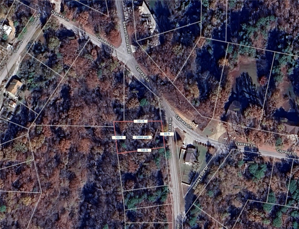 Beaver Lake area lot in the Beaver Shores Subdivision. Very Secluded with a few houses on the street. Prairie Creek Marina and 3 other boat launch ramps located just right around the corner. Minutes to Downtown Rogers. Water and electric at street.