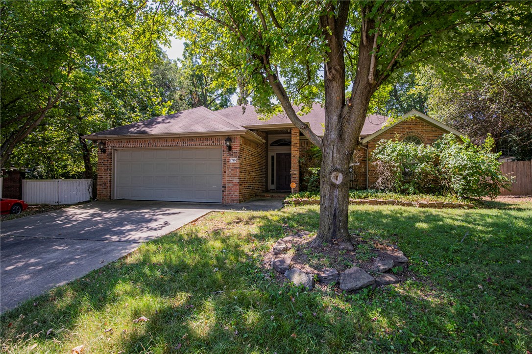 Great Home in Fayetteville!!! Fresh paint throughout. Crown moulding throughmain living area. 4 bedroom, 2 bath, living room has gas fireplace and hard wood flooring. Wonderful kitchen with lots of storage with tile countertops. Master suite has separate shower and jetted tub with double walk in closets and sinks. Large yard with beautiful mature trees, a nice patio area with an outdoor fireplace, also includes a small storage shed. Washer/dryer and refrigerator included.