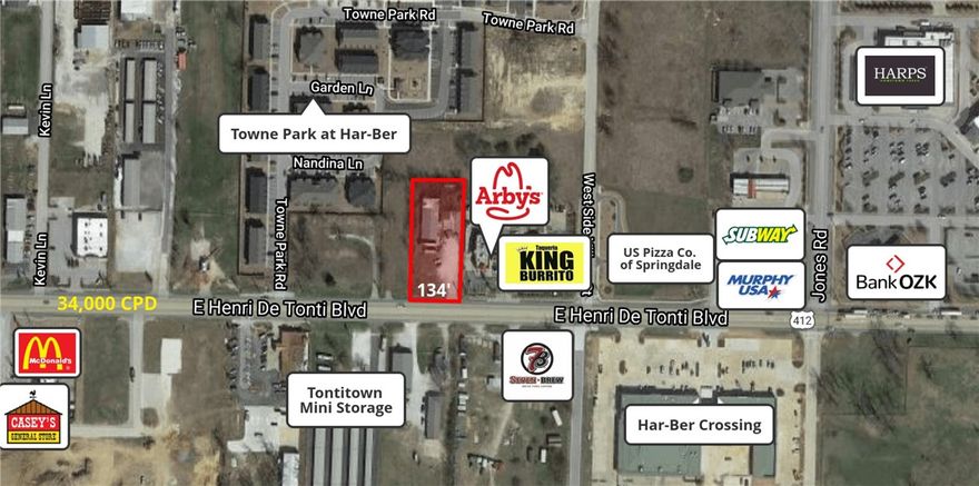 0.98 acres less than 2 miles from I-49. Within 1 mile of Har-Ber High School & 1.5 miles from Sam's Club. High traffic area with 34,000 CPD. 134' of frontage on Henri De Tonti. Water at street, property on septic.
Prime location right on the line of Tontitown & Springdale. Property has building on it, but being sold for the value of the land. Adjacent to Arby's and King Burrito. High traffic area near restaurants, retail, and residential communities.