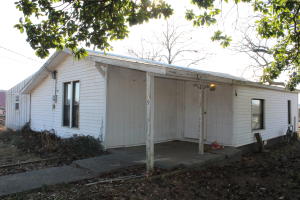 Owner Financing is an option with this cute home located just off Hwy 64 between Ozark and Altus. This home has an incomplete 2nd bedroom just waiting for the right buyer to make it perfect. Live in the home while completing the project!Perfect for a home buyer or investor. Call today to see this one.