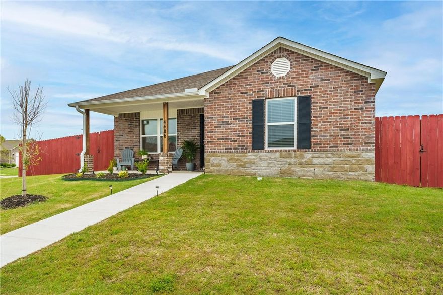 This well-kept, like new home, 2023, is comfortable and cozy with 3-bedrooms, 2-bathrooms on a corner lot in Providence Village, conveniently located near Rainbow Curve, the Walmart Distribution Center, restaurants and Bentonville business area. If you are looking to buy, you must see this gem that is rich with curb appeal, that includes a covered front and back porch, front yard landscaping / sodded yard. This fully fenced, 2-car garage home features an open floor plan and a large living room, cozy breakfast nook, a dining area, and a gorgeous kitchen fully equipped with energy-efficient appliances and ample counter space. Refrigerator, stove, microwave, dishwasher, washer/dryer all convey.  Schedule a showing and view this lovely home today!