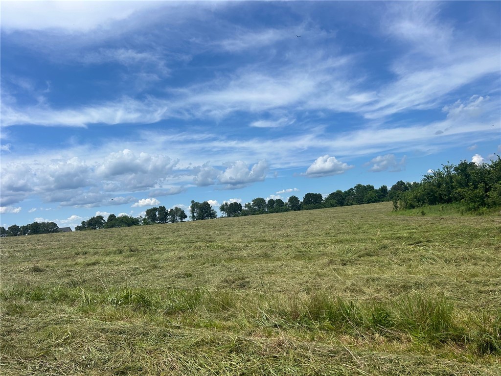 Looking to build your dream home? Look no further! This gorgeous 7 acre track has it all! Water available, natural gas close! Close to everything that Northwest Arkansas has to offer but far enough way and down a dead end road to help keep your privacy. Multiple building sites on this 7 acres! This track lays beautifully. This track has room for your dream home and shop or barn. Room for animals! Make your dreams come true on this beautiful track today!