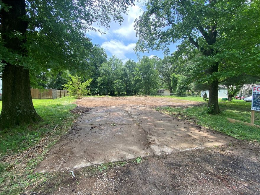 *200 yards from new Walmart Campus, Owner financing is a possible option. -Walk/Bike to David Glass Technology Center. Newly ReZoned C-3 Mixed Use (60ft height max/5 stories). This is an opportunity that will no doubt spark the creative minds of all Bentonville Developers! .31 acres with direct access the new WalMart Campus and the David Glass Technology Center. The new C-3 Mixed Use Zoning will no doubt change the entire street of Del White Drive moving forward. Currently there sits an occupied probable teardown home but with this property location and its back access to the future greenway connection to WM campus, this parcel could entertain any number of amazing commercial and residential mixed used development ideas (see example pics). Drive by the property anytime for a look!