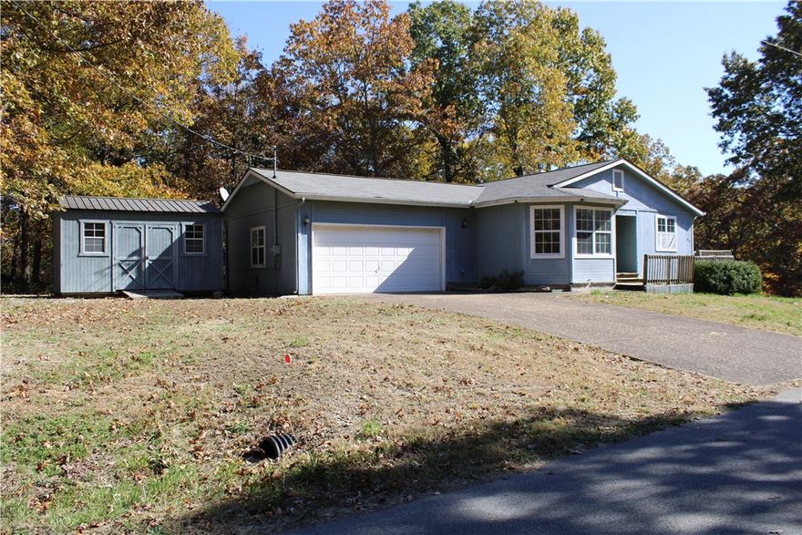 Seize the chance to make this 2-bedroom, 2-bath home your own, nestled on a flat, corner lot in the heart of Bella Vista. Spanning 1,359 +/- sq ft, this property offers a blank canvas ready for your personal touch and style—perfect for sweat equity enthusiasts! With a prime location and ample space, this home is ideal for customization. Sold as-is. Agent owned.