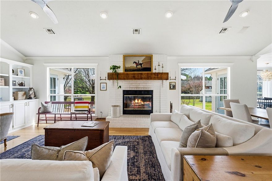 Over a million reasons to love this listing. Let’s name a few! Situated on a spacious 1.5-acre lot less than a mile from I-49 and access to the Razorback Greenway, this property offers the perfect balance of convenience with plenty of space between neighbors. The thoughtfully remodeled 2842 sq foot home has charm for days, welcoming you through the front door into an open, inviting living area with beautiful wood floors and a wood-burning fireplace. Just around the corner, the kitchen feels straight out of a magazine, featuring a wood island, slate floors, and stylish open shelving. Step outside to an in-ground pool that sets the stage for a fantastic upcoming summer of entertaining & relaxation. The 552 sq foot converted garage now serves as an accessory dwelling unit offering incredible flexibility perfect for in-laws’ quarters, a college student, or even a short-term rental for visitors to the Northwest Arkansas area. Homes rarely become available in this neighborhood, making this opportunity even more special.