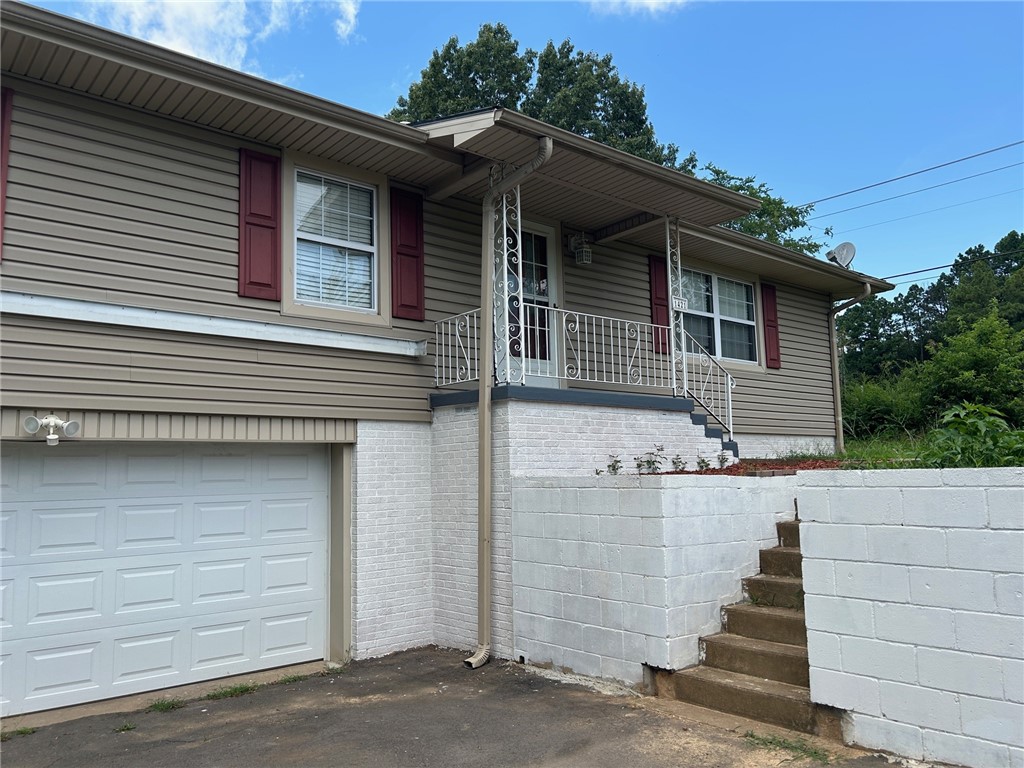 Large lot and lots of storage with this 1440 square foot 3 bedrooms 1.5 bath home.
New kitchen cabinets, countertops, dishwasher and some new flooring. Original hardwood flooring. Large new deck on back of the house. New garage door. Additional 600 sq ft in the basement that is heated and cooled. Refrigerator & washer also convey.