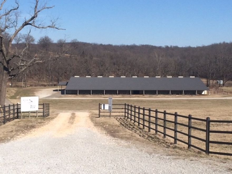 50,000 sq ft indoor Equestrian arena with a 1034 sq ft apartment. 132 acres with approximately 72 acres wooded and 60 acres open.  This is a horse lovers paradise, fantastic views abound for building that future home on this farm/ranch.  Owner states "bring on the offers."