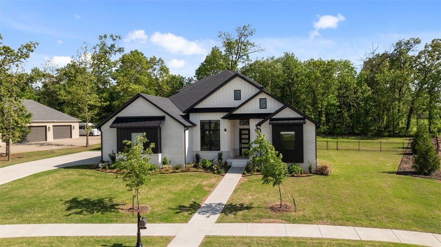 UPGRADES EVERYWHERE in the sought-after Scissortail community! This fully move-in ready home has been meticulously finished with attention to every detail. STUNNING contemporary kitchen is a standout, featuring high-end stainless steel appliances, a convenient pot filler, and two dishwashers for maximum functionality. The luxurious owner’s suite includes a walk-in closet with space for your entire year-round wardrobe, plus a spa-like bath complete with a relaxing soaker tub. Upstairs, enjoy a spacious second living area—perfect for entertaining or unwinding. Walk outside and find covered patio overlooking spacious fully fenced back yard perfect to create your outdoor oasis. 3 car garage includes inground storm shelter. Ideally situated just a short stroll from the Clubhouse, playground, family and adult pools, firepit, and sports courts.  Enjoy the feel of newer home without the wait or stress of new construction.