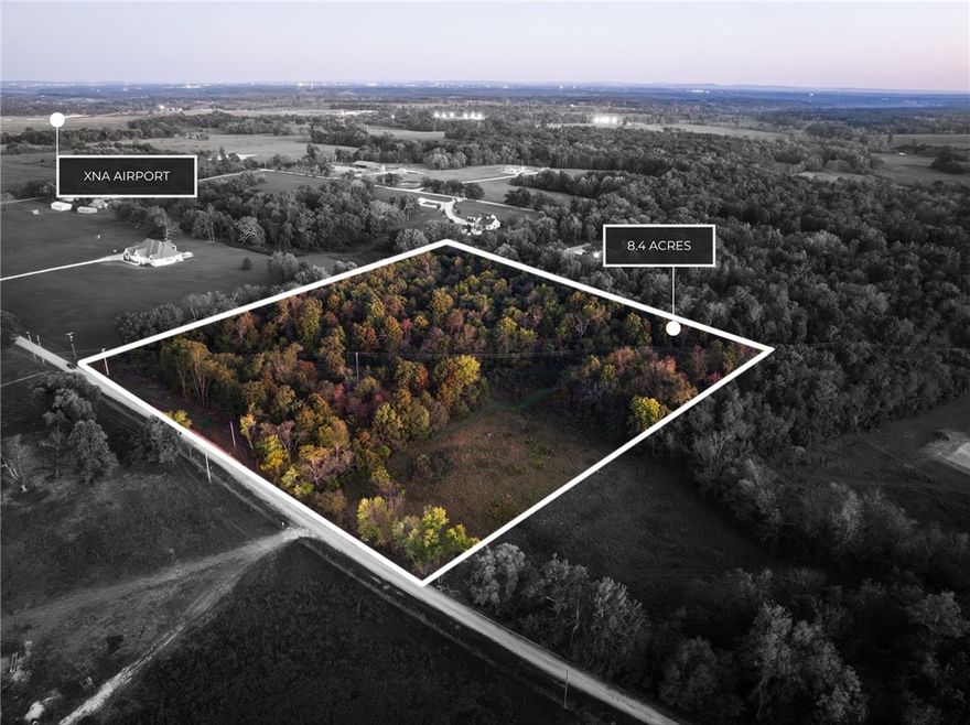 Don’t miss this rare opportunity to own 8.4 level acres in the heart of one of Northwest Arkansas’ fastest-growing areas! Located within the Highfill city limits & part of the highly sought-after Bentonville School District, this beautiful property offers the perfect blend of open pasture & woods, giving you both privacy & space to build your dream home or future investment. Public water & electricity are available at the street. Just minutes from Northwest Arkansas National Airport, you'll enjoy the peace of country living with the convenience of nearby amenities, shopping, & schools. Whether you're looking to build now or invest for the future, this property has the location & layout to match your vision.