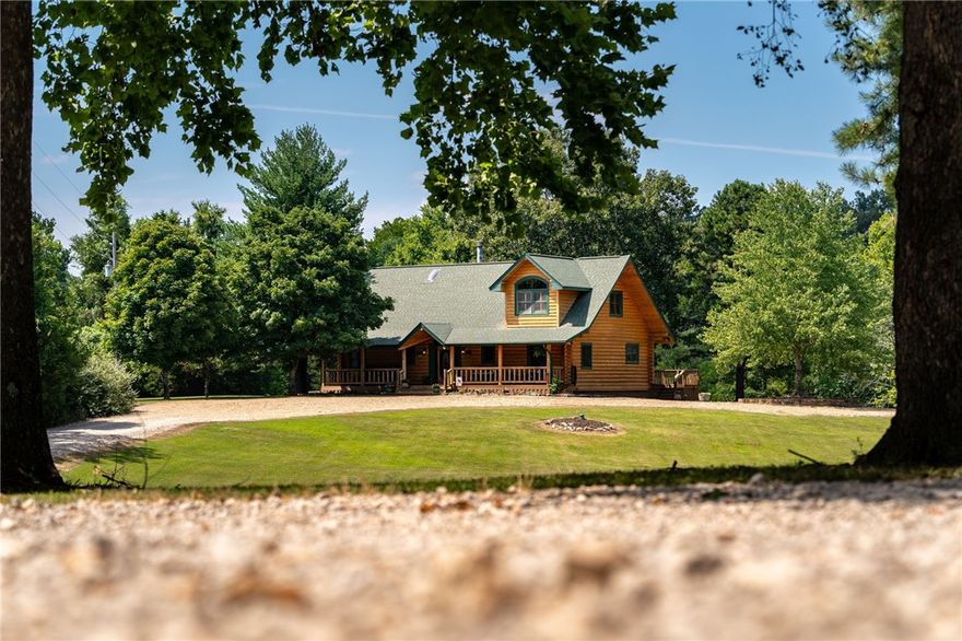 Stunning Colorado Log Home on Table Rock Lake.
Experience rare, excellent craftsmanship in this real tongue and groove Colorado Log Home on Table Rock Lake/White River. Overlooking the iconic Beaver Bridge on 6.3 acres with extensive water frontage and stunning level grounds, this property offers the perfect blend of luxury and nature. Featuring an open living, dining, and kitchen area, featuring a massive see-through fireplace and a spa tub in the primary bedroom. Cathedral ceilings and masterful woodwork open to second-story and loft, provides a versatile space for an office or extra sleeping area. Enjoy the scenic fire pit or your own driving range by boating up to the water's edge. The 1800 sq ft oversized garage, not part of listed footage, is perfect for boat storage and includes a workshop w/ a timeless Spin Fire heater and AC window unit for additional usable space.
Furniture is negotiable. Just minutes to the fun and funky town of Eureka, don’t miss this opportunity to own this special piece of paradise.