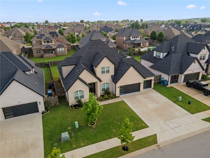 Welcome to 1408 SW Breeze Ct – a beautifully designed 5 bed, 4 bath home with 3,087 sq ft of space and style in one of the best locations in Northwest Arkansas. This home has a fantastic layout with the primary suite and a guest bedroom on the main level, plus three bedrooms, two full baths, and a large bonus/media room upstairs—perfect for movie nights, game days, or extra space for the family. You’ll love the elegant kitchen, dedicated dining room, dry bar, and all the designer touches throughout. Hardwood flooring and ceramic tile throughout the home, as well. Outside, enjoy a fenced and flat backyard with a cozy outdoor fireplace—ideal for relaxing or entertaining year-round. Plus: a 3-car garage with epoxy floor, quiet cul-de-sac location, and you’re just minutes from Bentonville schools, the Community Center, shopping, restaurants, and the Walmart Home Office. This one truly checks all the boxes—location, layout, and style. Don’t miss your chance to live in one of NWA’s most desirable areas.