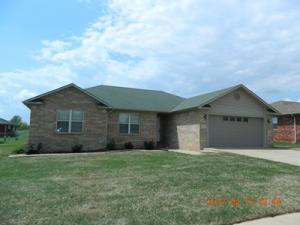 Well maintained brick rancher in immaculate condition. Landscaped, manicured lawn, outbuilding, and large rear patio perfect for summer BBQ's.Quality built w/ custom touches such as hardwood flooring, oversized trim, and custom oak cabinetry. Fully equipped eat-in kitchen & breakfastbar. All electric low maintenance home offered with a 1 yr. home warranty for peace of mind. This MOVE in ready home is ''Must See.''