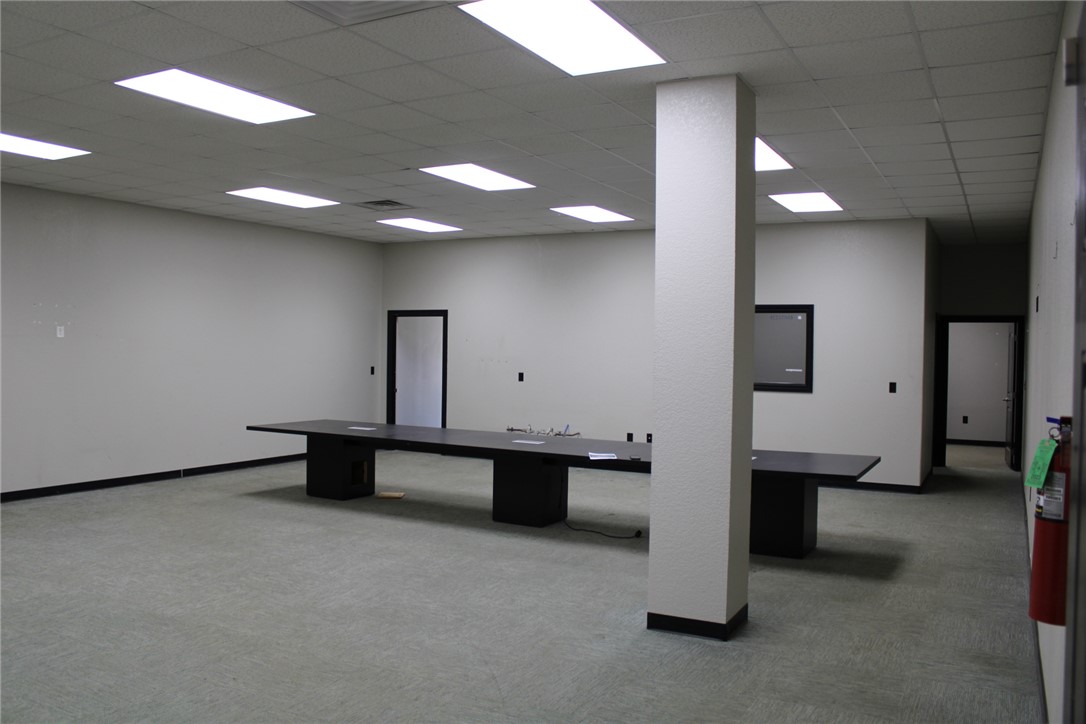 Spacious commercial interior featuring recessed li