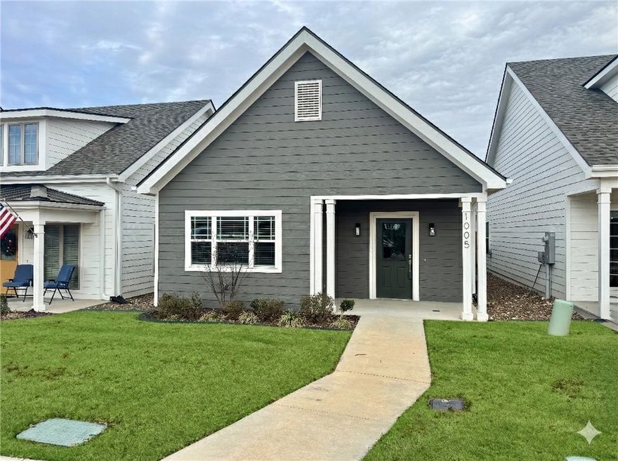 Unbeatable location near Crystal Bridges Museum, the Alice Walton School of Medicine, Downtown Bentonville & Walmart’s new campus. Enjoy a vibrant community with top-tier amenities, including a clubhouse, pool, pickleball court, dog park, yard maintenance & access to the countries top premier mountain biking trails. Fitzgerald floor plan boasts LVP flooring, crown molding, blinds, ample storage & quality throughout. The living room & dining area offer a seamless open floor plan, perfect for entertaining, with abundant natural light & smooth flow into the chef’s kitchen. Chef’s kitchen features 3cm granite countertops, Frigidaire stainless steel appliances, refrigerator, a pantry, tons of storage & abundant natural light. Spacious primary suite includes a perfect ensuite bathroom with walk-in tile shower,