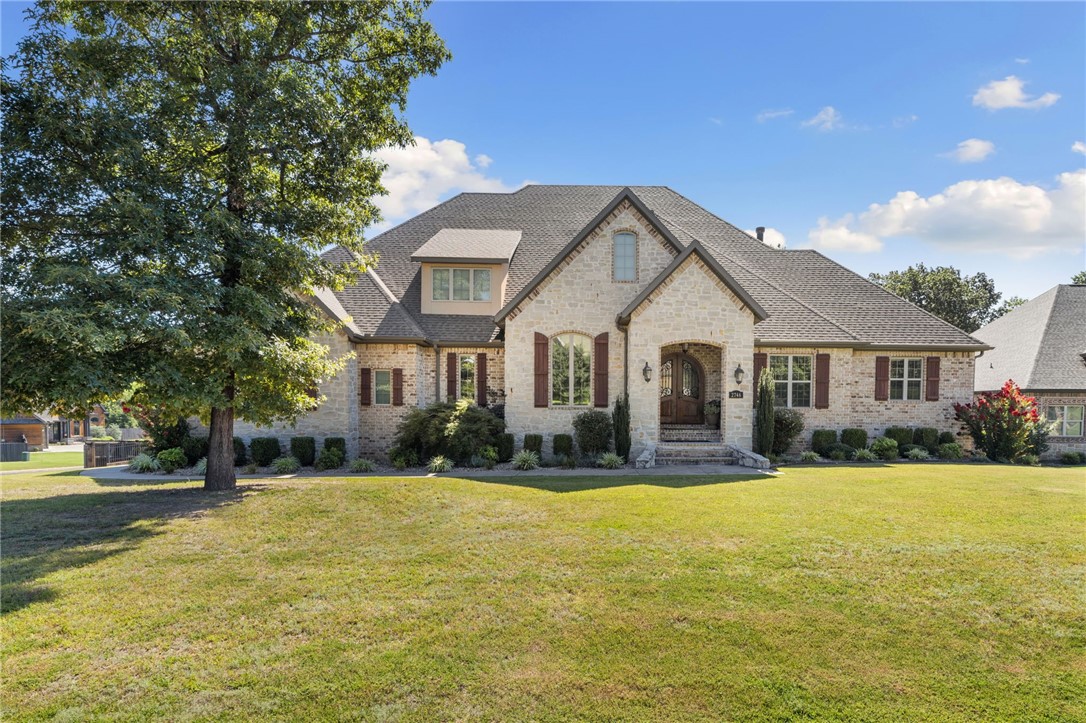 Looking for the perfect place to spread out, entertain, and make lasting memories? This incredible home on .89 acres has it all! Inside, you'll find 4 roomy en-suite bedrooms, 2 on the main floor, 1 upstairs, and the other on the lower level. The kitchen features a commercial size fridge and freezer, butler's pantry with wine cooler and ice machine! Downstairs is where all the fun begins! Including a fully loaded gym, home theater room, full sized Bar area with custom built in cabinets, and an infrared sauna! Other extras include new carpet throughout, new pump for the pool, new privacy fence, 2 levels of decks and patios that stretch the length of the home, full irrigation system, wired for sound throughout! Whether you are entertaining, or enjoying a quiet evening by the pool, this home is designed for real family living, with a serious fun factor built in!