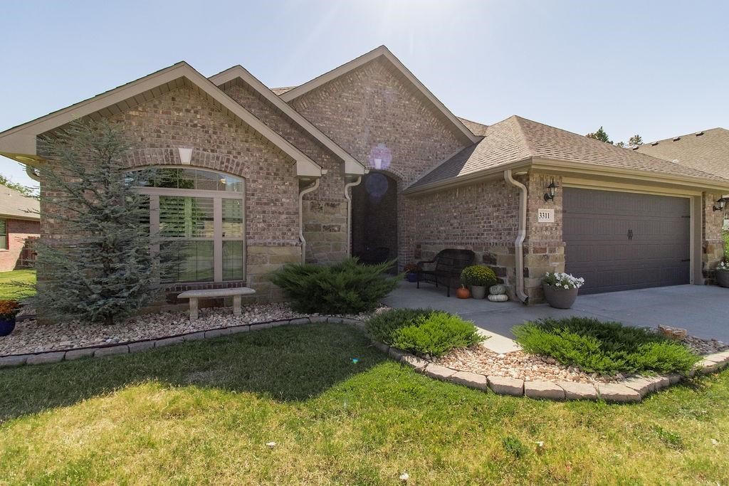Beautifully well-kept home in desirable Willowbrook Farms! Inside, an open layout with a large island, modern finishes, and plenty of windows opens to a tranquil backyard setting. The house and covered patio backs up to wooded privacy, hard to find in SW Bentonville! This neighborhood has unique amenities with walking trails, a dog park, and of course a community pool! Come see this great opportunity asap!