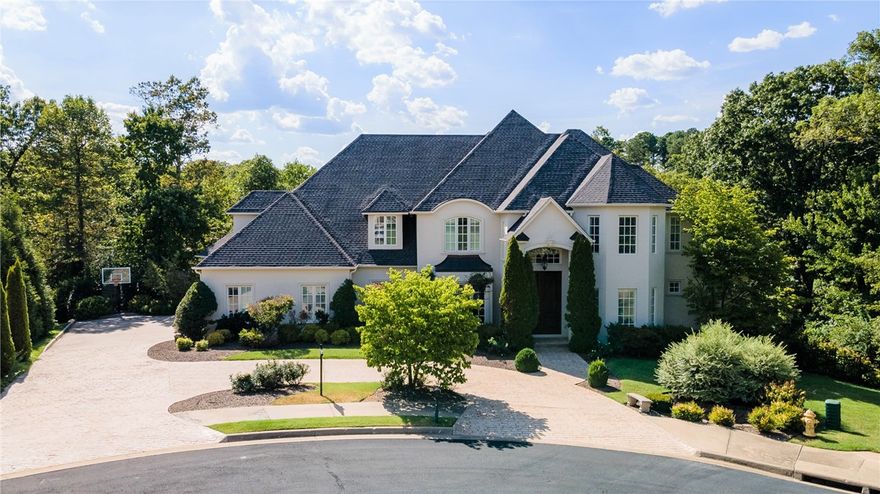 STUNNING 5 bedroom home on Blessings Golf Course in gated Clear Creek subdivision. Amazing views of the 12th and 13th fairways and the charming wood cart path bridge. Amenities galore include Formal Living Room, Dining Room, Office, Bonus Room, Playroom, Exercise Room, 5 Full Baths, 2 half baths, and all bedrooms feature en suites. Stunning gourmet Chef's Kitchen remodel by distinguished decorator. Kitchen features include granite and marble counter tops and 2 islands. Seller has completed many updates! Main level hardwood floors newly refinished. Elegant newly painted brick, cast stone and stucco exterior in 2022. Stamped concrete walkways nestled in beautiful mature landscaping. Enjoy endless opportunities for entertaining both in spacious interior and outdoors! Don't miss the opportunity to buy this spectacular property!