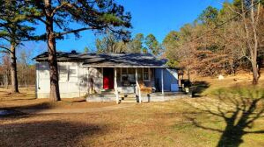 Looking for a small home with room for your animals...Check out this cozy 2-bedroom 1-bath home on 3.3 acres just outside of Dardanelle. Kitchen was recently updated and newer heat and air. The utility room offers washer and dryer connections and enough space for storage or even an office area. Two fenced pastures with a barn.