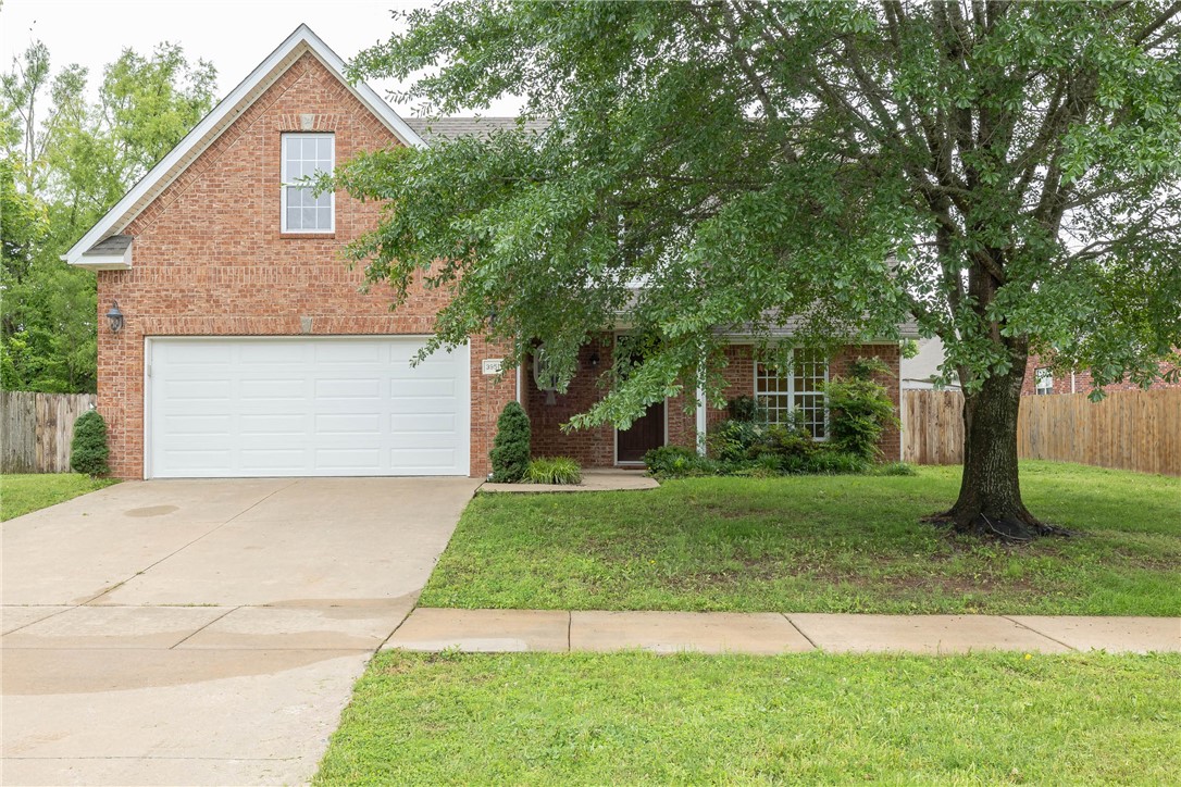 Beautifully updated, bright & move-in ready 3 bed, 2.5 bath home in a sought-after Fayetteville neighborhood. Located near schools, I-49, restaurants, shopping & the Razorback Greenway Trail, this home offers both comfort & convenience. Freshly painted throughout with updated lighting & new flooring, including plank hardwoods on the main level & new carpet upstairs. The living room features a gas fireplace with marble surround & hearth, vaulted ceiling, shiplap accent & 2-story entry. Kitchen includes eat-in area, granite counters, shiplap backsplash, Bosch dishwasher, stainless appliances, pantry, newly painted cabinets & bar seating. Formal dining with transom window & new chandelier. The owner's suite was fully remodeled with new flooring, marble-top vanity, soaking tub, tile shower with glass surround, new lighting & walk-in closet. Two upstairs bedrooms & huge bonus room share a remodeled full bath. Enjoy a fenced backyard with patio, pergola & deck with built-in seating, plus newer roof & HVAC.