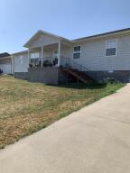 Very nice 1500 sq. ft. home in family friendly neighborhood. Cement storm shelter under front yard porch and back yard is privacy fenced. Open living room, dining room, kitchen area. Built in 2012. Large utility room. Very nice kitchen appliances. Energy efficient. This will make an awesome starter home. Nice neighborhood and very nice view! Great place to raise your children.