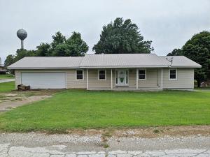 Updated 3BR/1 1/2 Bath home in Valley School District with huge living room fenced back yard, corner lot, covered back porch, & storage room in garage. Low maintenance exterior with vinyl siding & metal roof. Updated windows, new patio door, new shower in main bath & much more. Perfect for the 1st time home buyer. All #'s are approx, age is estimate, sq footage per assessor.