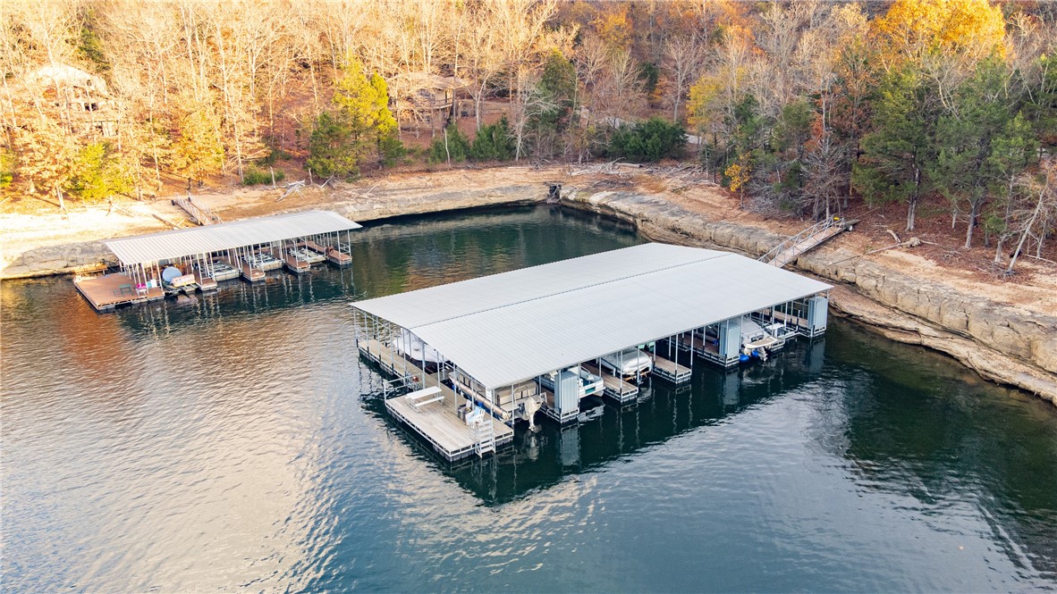 Amazing lake lot that has it all!... incredible lakeviews, nearby attached boatslip, buildable topography, and a beautiful neighborhood! A most ideal place to build that dream lake home you've always wanted. Lot is part of the Huckleberry Hills division (minimal covenants attached). Public water.