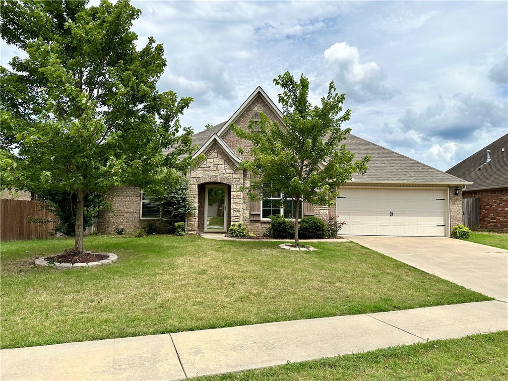 This charming single-level brick home offers an inviting blend of comfort and convenience. Featuring three bedrooms and two bathrooms, the split floor plan is perfect for families or anyone seeking single-level living. As you walk through the front door you'll find the living area, highlighted by a cozy gas log fireplace and custom mantel. The eat-in kitchen provides access to the covered back porch with an additional gas log fireplace, creating an ideal space for year-round outdoor enjoyment. The roof was replaced in 2020 and the washer and dryer may convey with an accepted offer. Located near trails, schools, and the future Underwood Park, this home is a rare gem that offers a unique blend of peaceful living and convenient access to local amenities.