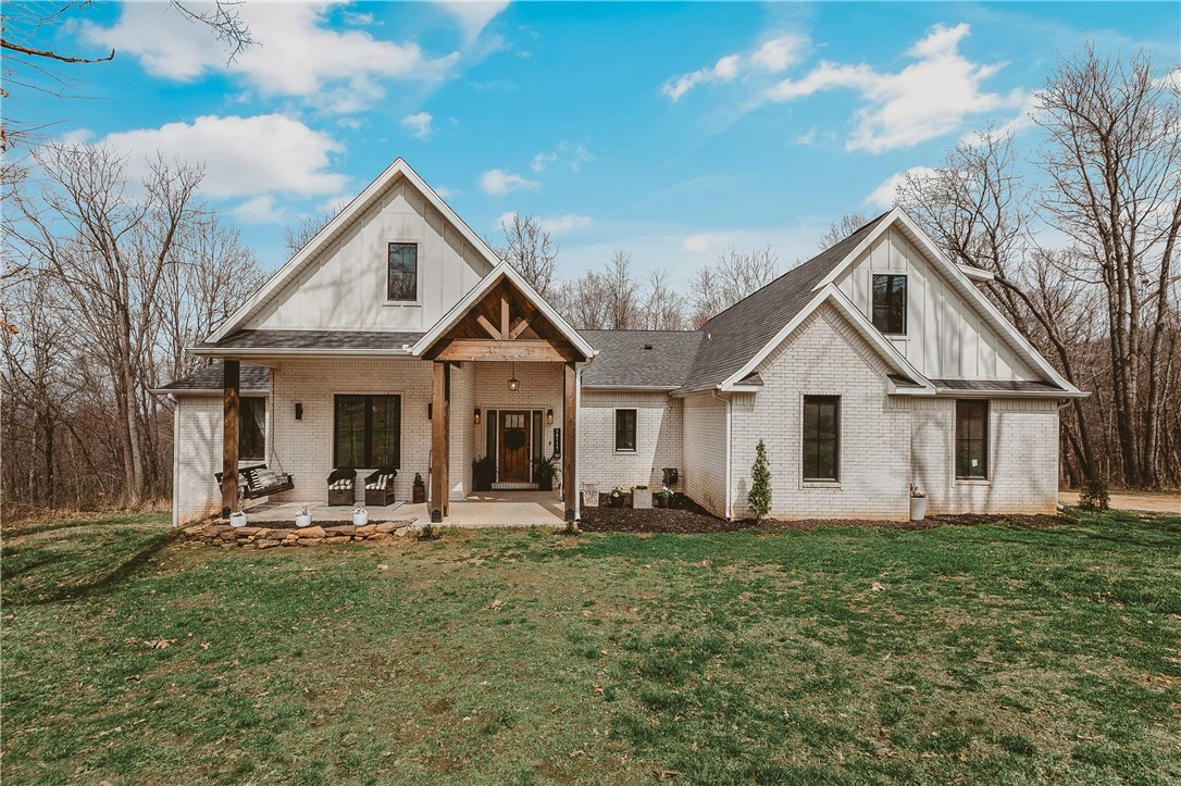 VERY MOTIVATED SELLER!!! Experience the combination of LAND, LOCATION and ARCHITECTURE all in one 27 acre, secluded, slice of paradise, in the country! This property stands unmatched in the market. County Craftsman style home that blends modern farm house. First of its kind built in Arkansas by Architectural Designs house plans. Quartz countertops throughout with chic marble backsplash in kitchen, self closing cabinets, mud room with dog washing station and built in locker style storage. DREAM master suite boasting a 13x x15 walk-in closet. Free standing tub in master bath with his and her sinks. Butcher block counter tops in laundry room with pocket doors and easy access to master. 50x70 shop with RV hookupās and 16ft sidewalls 14 ft door with opener, 2 - 12 ft roll up doors on sides. Wet weather creek with native stones and bountiful deer! Close to everything, 8 miles to hiking at Devilās Den and 8 miles to town or I49.