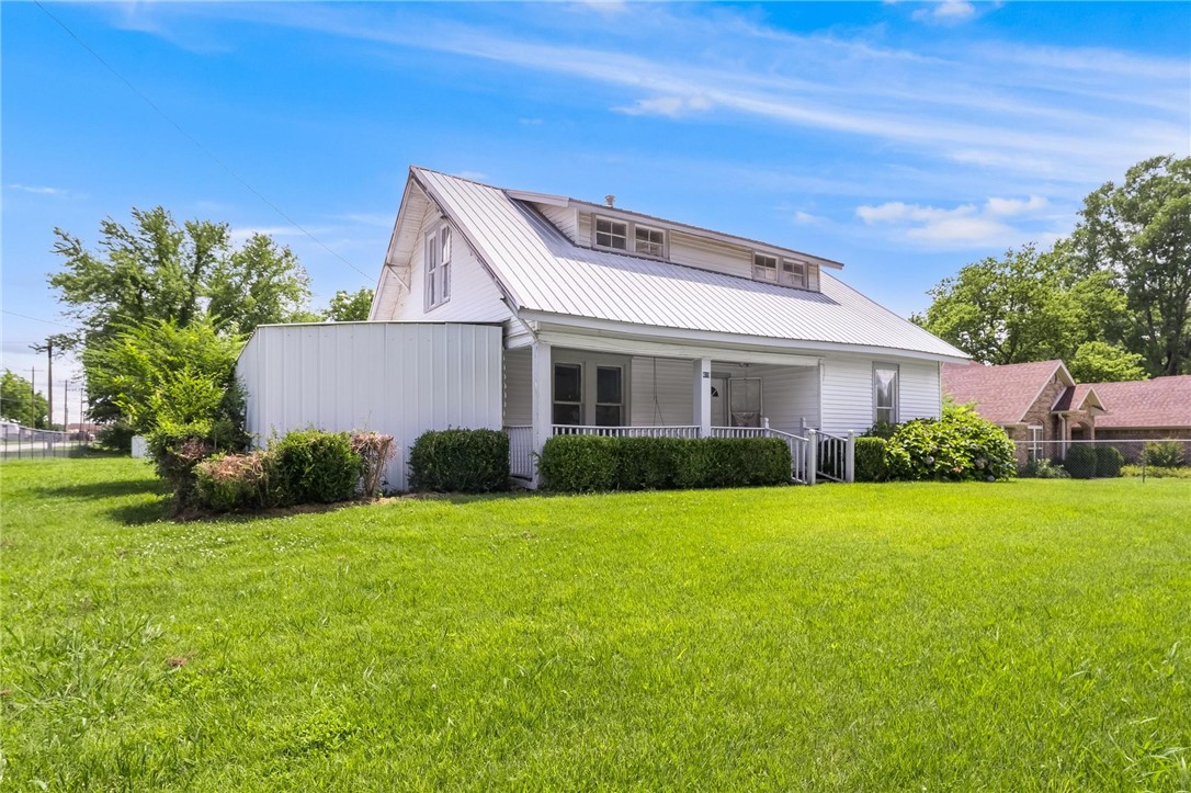 This country craftsman has paradise potential! Sitting on an oversized lot, this property boasts a century home, workshop, storage shed, and a private, enclosed pool. The heated pool has been well-maintained and is a must see. The two large bonus rooms could be converted to bedrooms. Come see it today and see how with some TLC and remodeling, this could be your dream home!