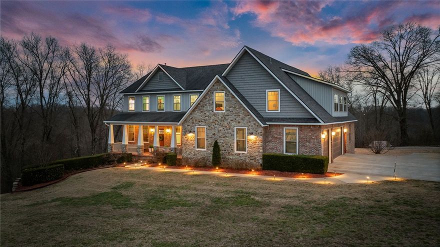 Welcome to 11010 Meadow Lark Rd in Rogers, Arkansas — a custom-built home tucked at the end of a quiet cul-de-sac on 2.53 acres with a peaceful wooded backdrop. Conveniently located just 10 minutes from downtown Rogers and less than 20 minutes to the new Walmart Home Office, this property offers the ideal blend of privacy and accessibility.
Spanning three levels 5180 sq ft, this thoughtfully designed home features 6 bedrooms, 5.5 bathrooms, two living areas, and two kitchens, creating an ideal setup for multigenerational living, guests, or flexible entertaining spaces. Quality craftsmanship is evident throughout, along with valuable upgrades including a safe room, partial backup generator, and energy-efficient solar panels that help keep utility costs low.
With timeless finishes, expansive living spaces, and a serene natural setting, this property offers space, functionality, and modern efficiency — a rare opportunity to enjoy country living while remaining close to everything Northwest Arkansas has to offer.