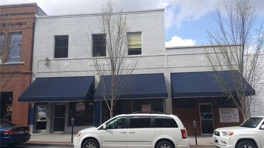 Downtown Investment opportunity! Right off the square, this former law office may be exactly what you need for your new business. 6900 m/l sq ft on 2 levels with possible space for lofts. Lot Size is 32 ft 4 in. x 119 ft with 12 ft in the alley  Zoned DC the options for build out are endless!