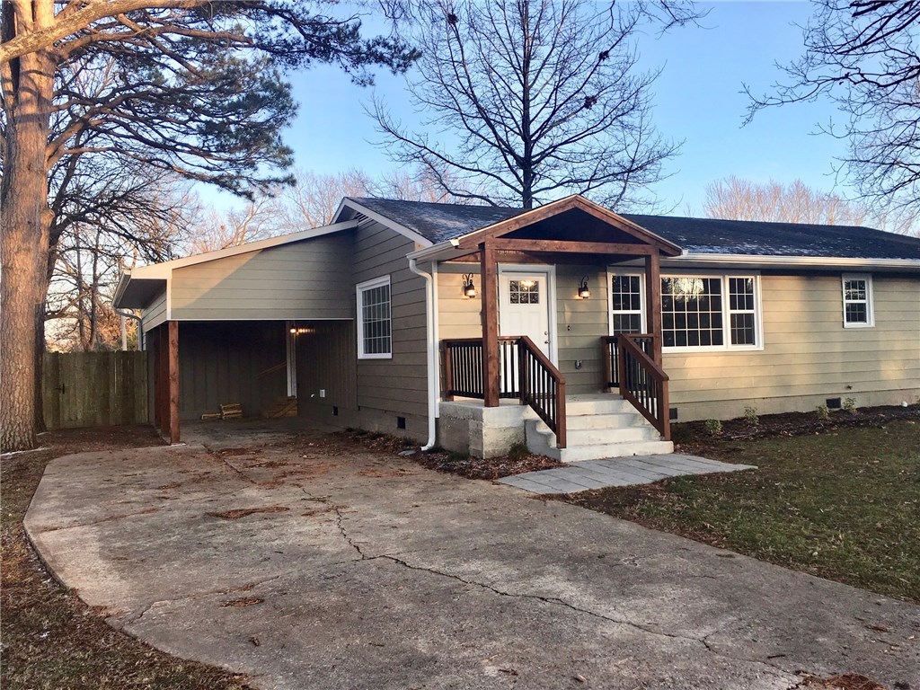 PRICE REDUCED $10,000 ON THIS BEAUTIFULLY REMODELED HOME JUST LIKE BRAND NEW Large bonus room could be 4th bedroom.Kitchen features white shaker style cabinets & pantry,granite countertops,subway tile backsplash,stainless appliances includes refrigerator.Restored original hardwood floors.All new plumbing includes fixtures & tank-less water heater.New electrical includes light fixtures & can lights.New drywall & paint.Large fenced backyard ideal for pets & children.Located near shopping & downtown.
